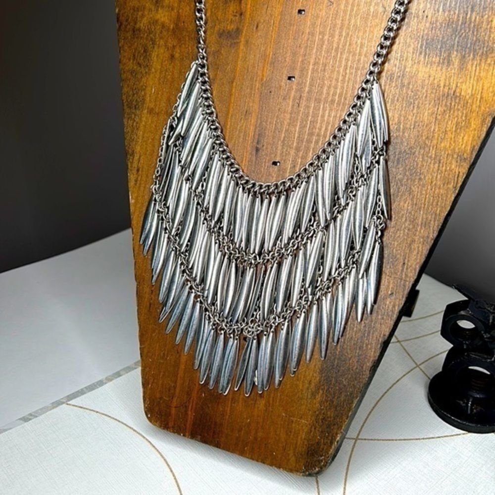 Silver, toned bow, Paul bib necklace